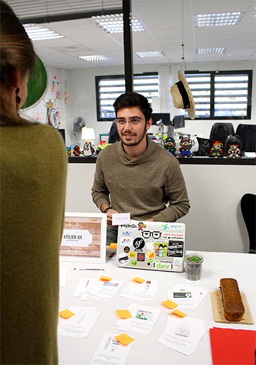 Man smilling at participant during event